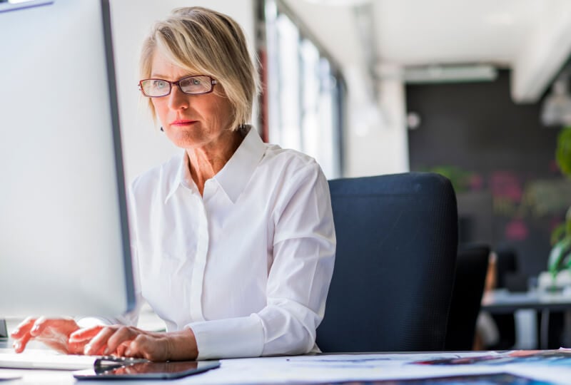 a woman working on a computer